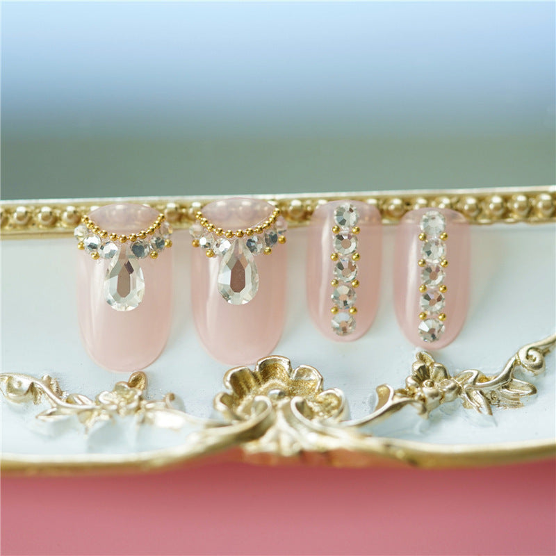 Women's Nude Pink Short Almond Shaped False Nails with Jewel Adornments-Theone Apparel