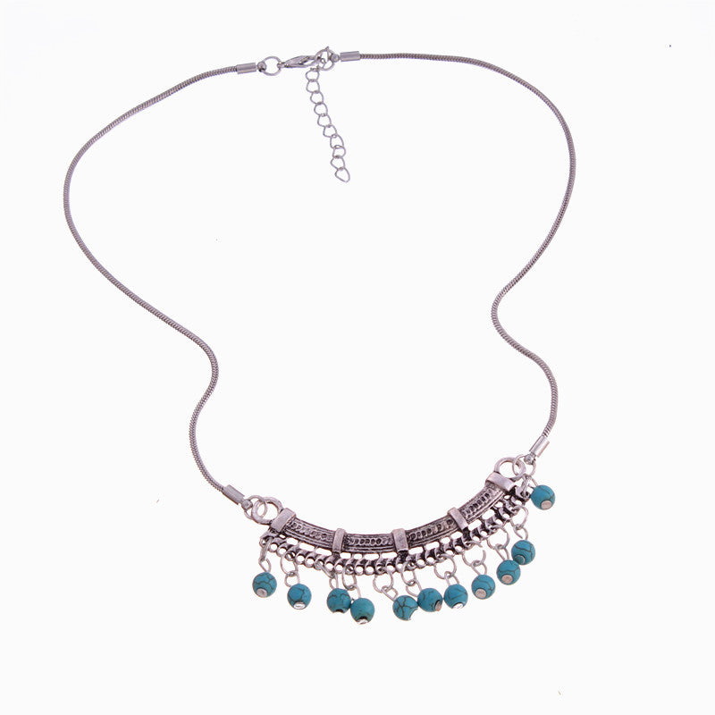 Metaal en turquoise kralen ketting