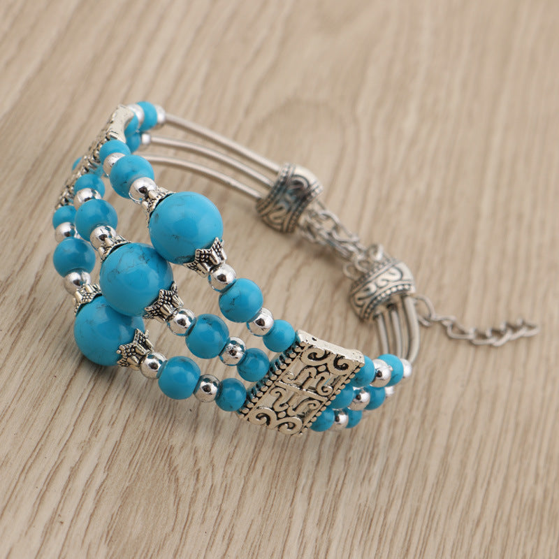 Pulsera de cuentas azules de tres niveles