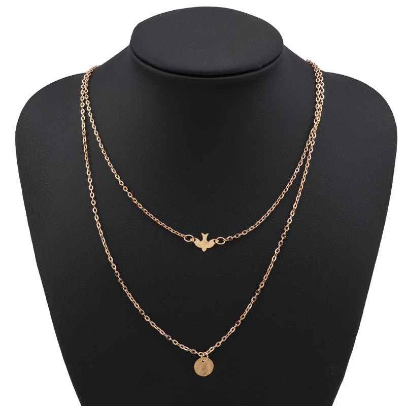 Bird and Disc Strand Necklace - THEONE APPAREL